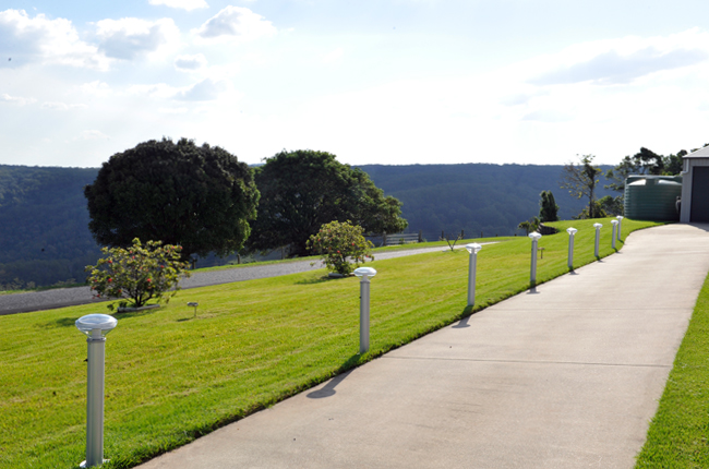 Solar lighting powered by sunlight as a clean renewable energy source for outdoor infrastructure