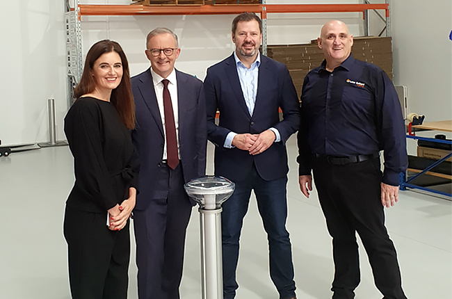 Solar Bollard Lighting leadership team with industry partners at official event