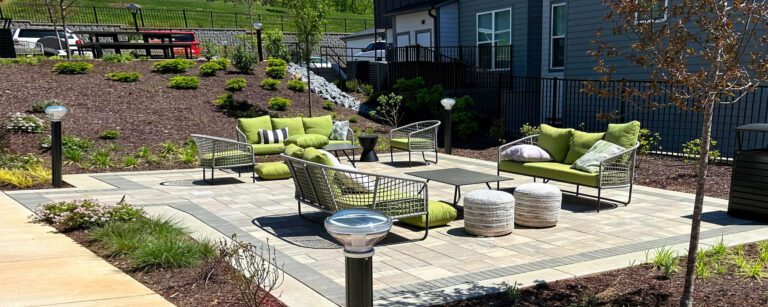 SBL2 solar bollard light beside the landscaped courtyard at Axis at the Park residential community in Charlotte, North Carolina.
